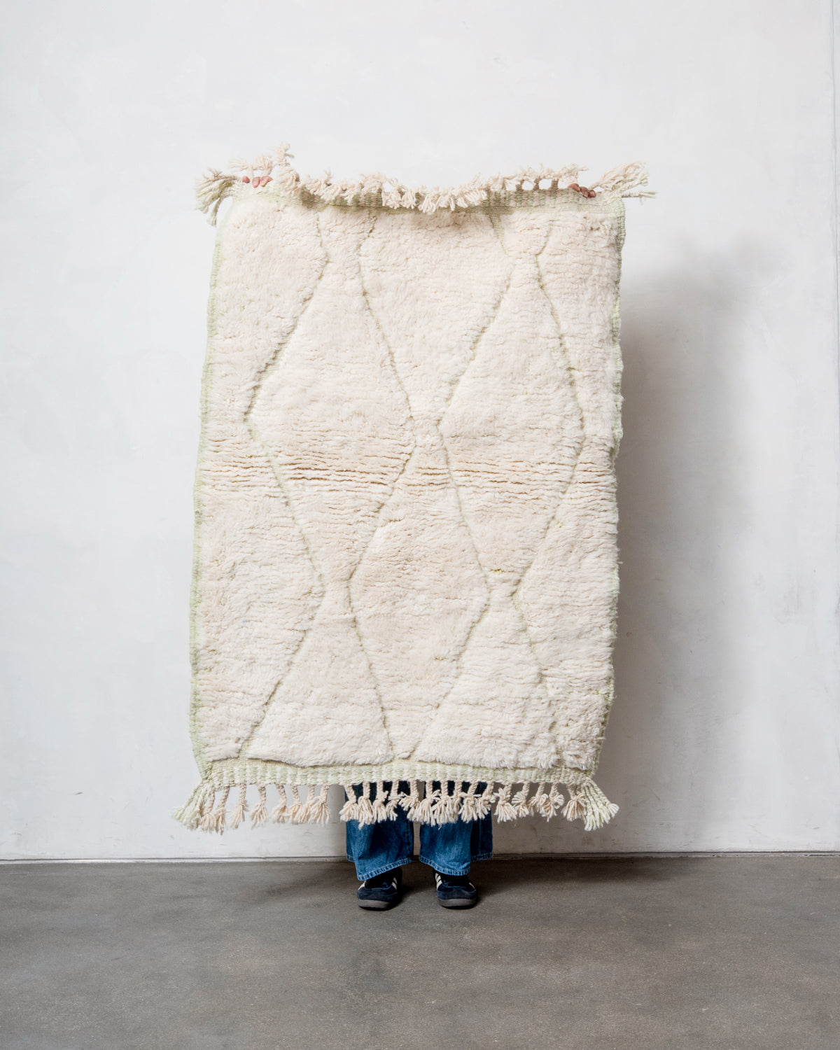 Modern, designer, handcrafted Berber rug from Morocco. Beniourain carpet with beautiful colours and patterns and fluffy wool texture.